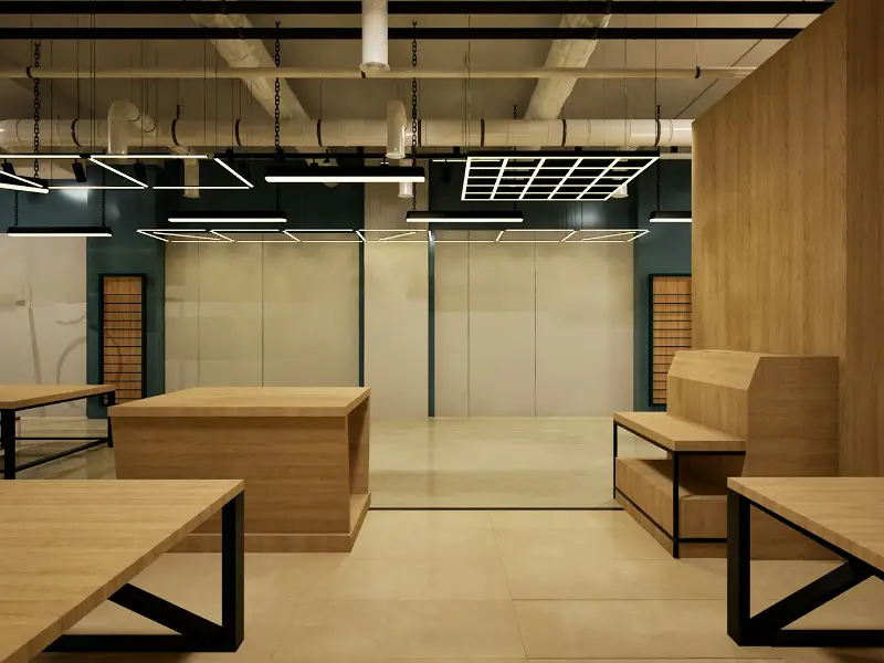 Showroom cu postamente din lemn și lumină liniară pe tavan